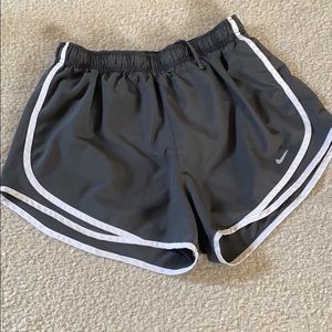 Gray and white Nike dri-fit tempo shorts